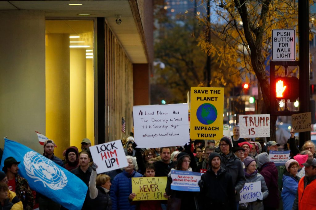 Demonstrators complete a loop of downtown during a nationwide protest following the resignation of attorney general Jeff Sessions and President Donald Trump's appointment of Matthew Whitaker at Piatt Park in downtown Cincinnati on Thursday, Nov. 8, 2018. (Photo: Sam Greene)